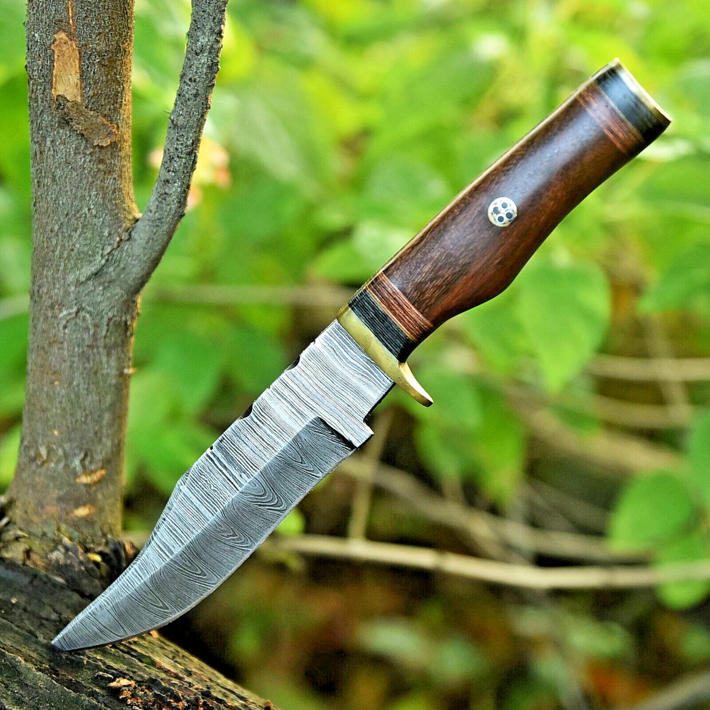 10-inch Damascus steel hunting knife with leather sheath included.