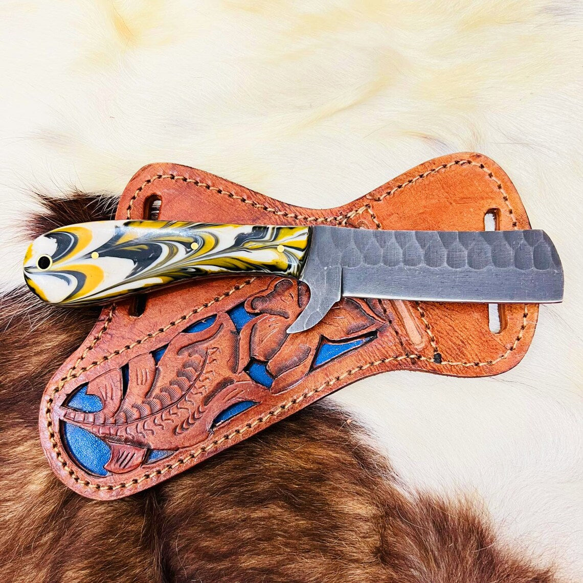 Bull Knife featuring 4-inch hand-forged J2 steel blade and resin handle