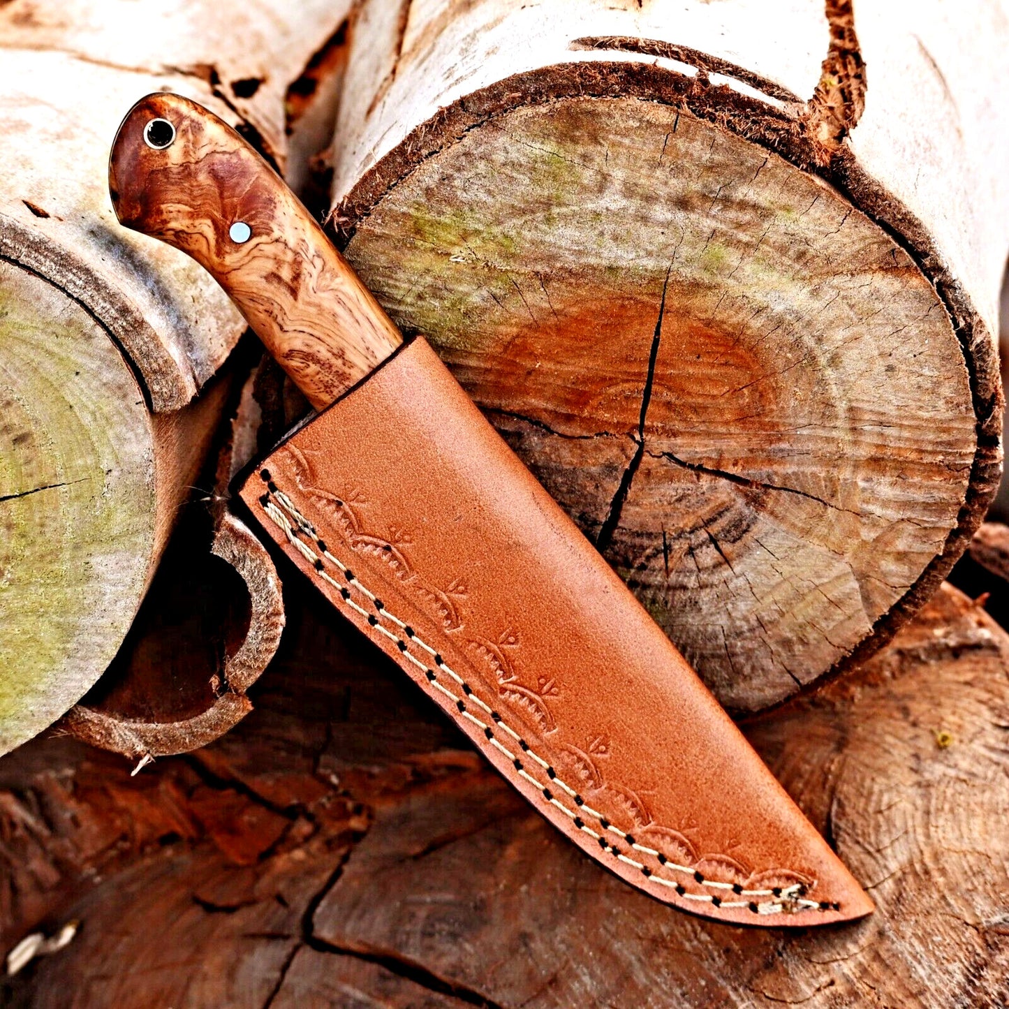 "Damascus steel hunting knife with 10-inch blade, rosewood handle, and leather sheath"