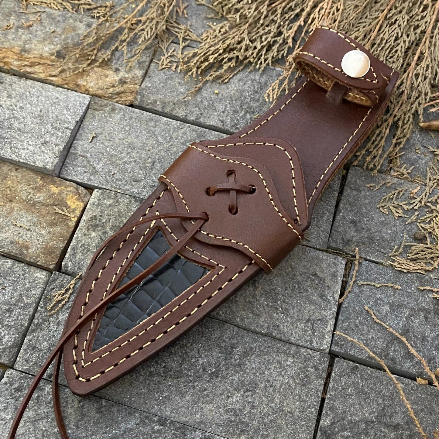 Handmade Damascus steel knife with rosewood handle, Damascus steel guard, and leather sheath, ideal for hunting.