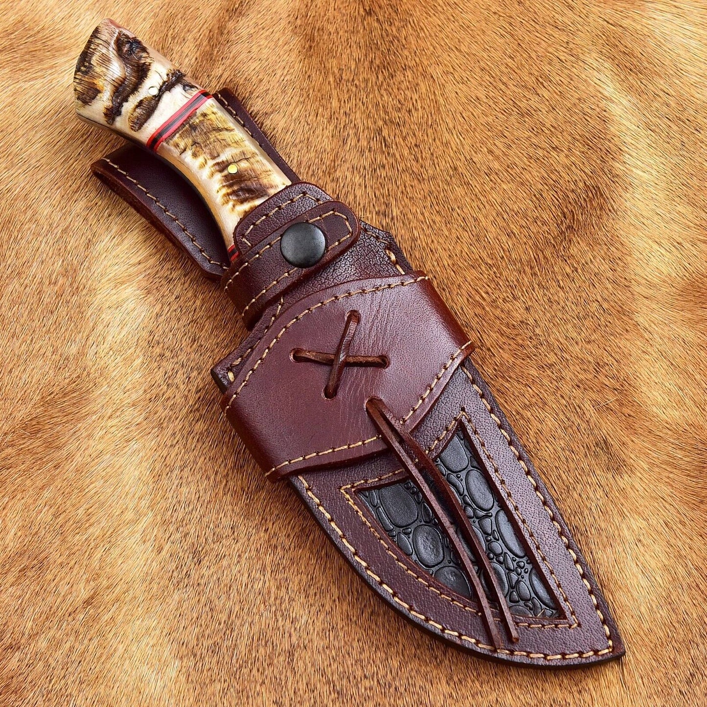 Handmade Damascus steel skinning knife with 4.5-inch blade and sheep horn handle, ideal for hunters and collectors