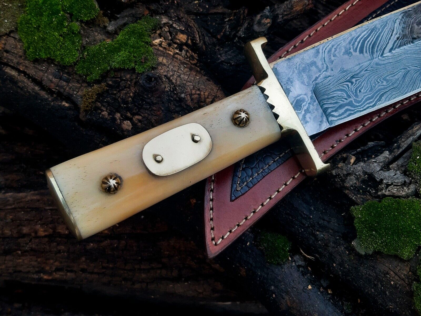 "13-inch Damascus steel cowboy bowie knife featuring brass guard and leather sheath"
