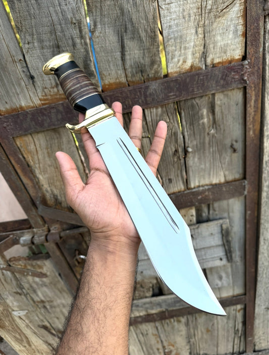 16-inch Crocodile Dundee hunting and camping fixed blade knife with J2 steel blade, leather handle, brass guard, and leather sheath