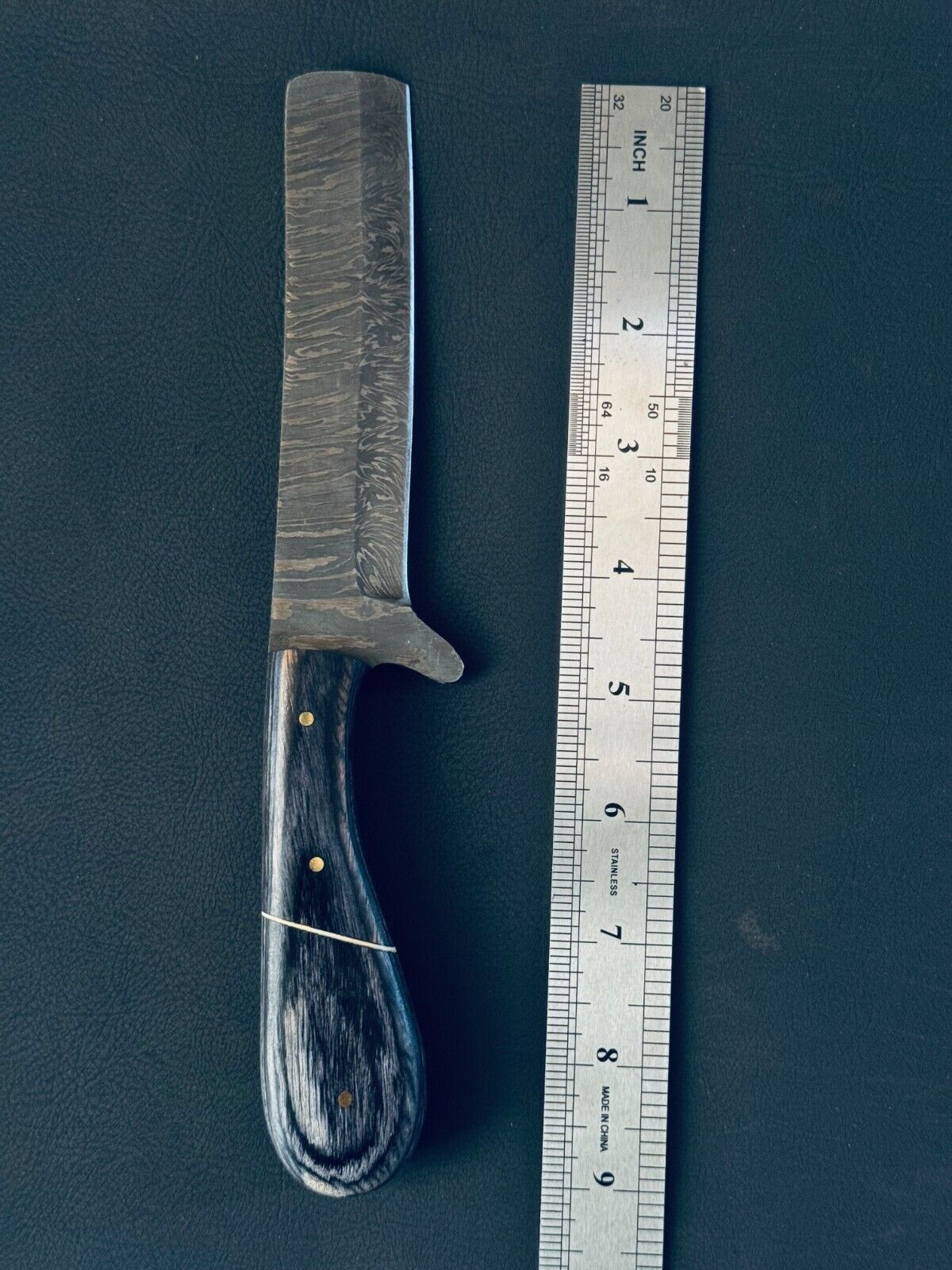 5-inch Damascus steel calf cutter knife featuring pakkawood handle and brass guard
