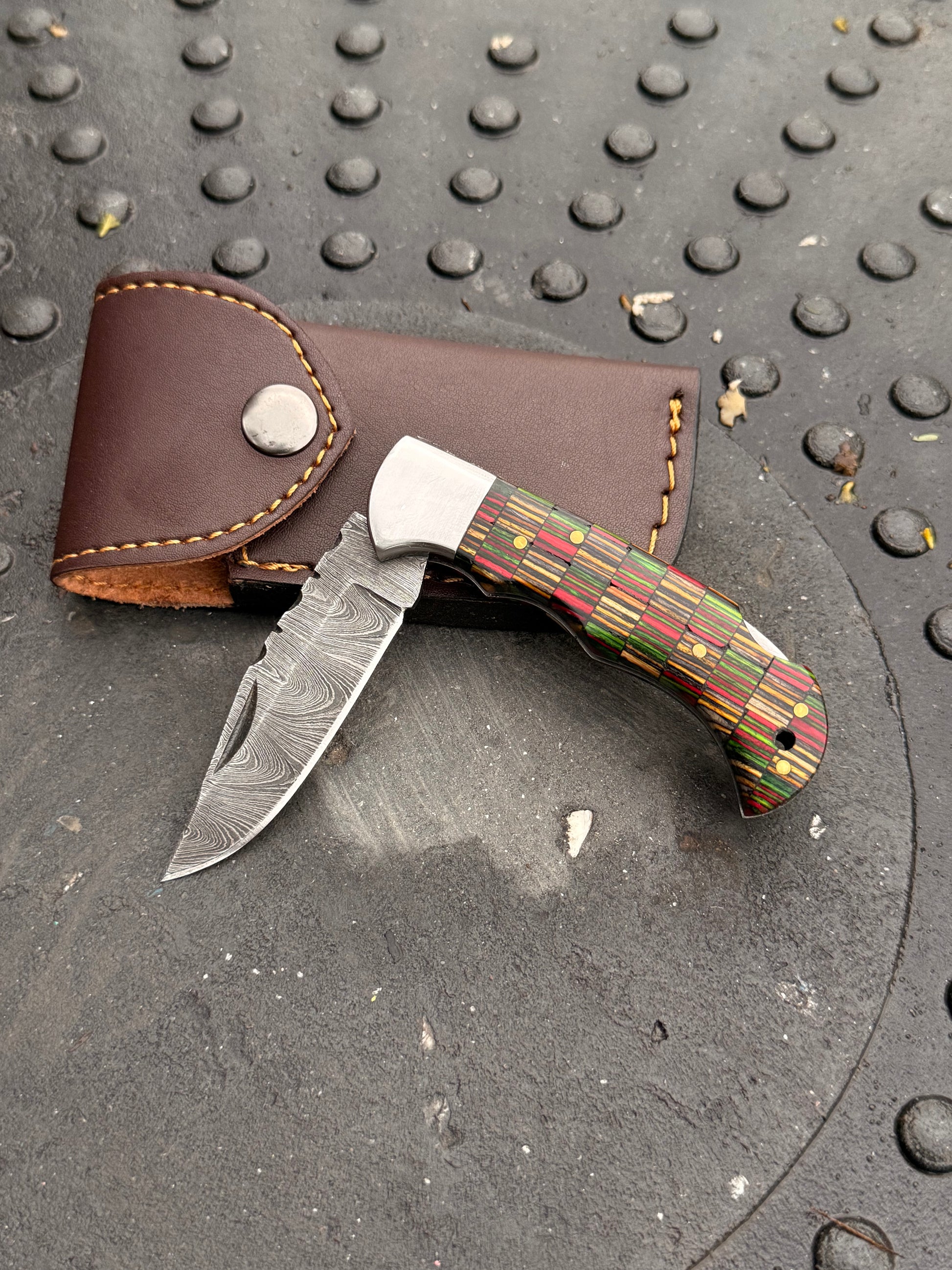 6-inch handmade pocket knife with Pakkawood handle and genuine leather sheath
