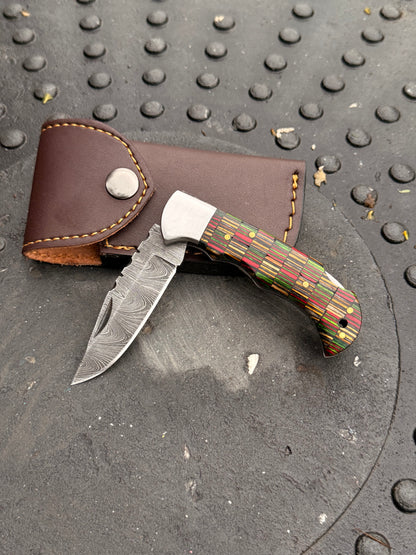 6-inch handmade pocket knife with Pakkawood handle and genuine leather sheath