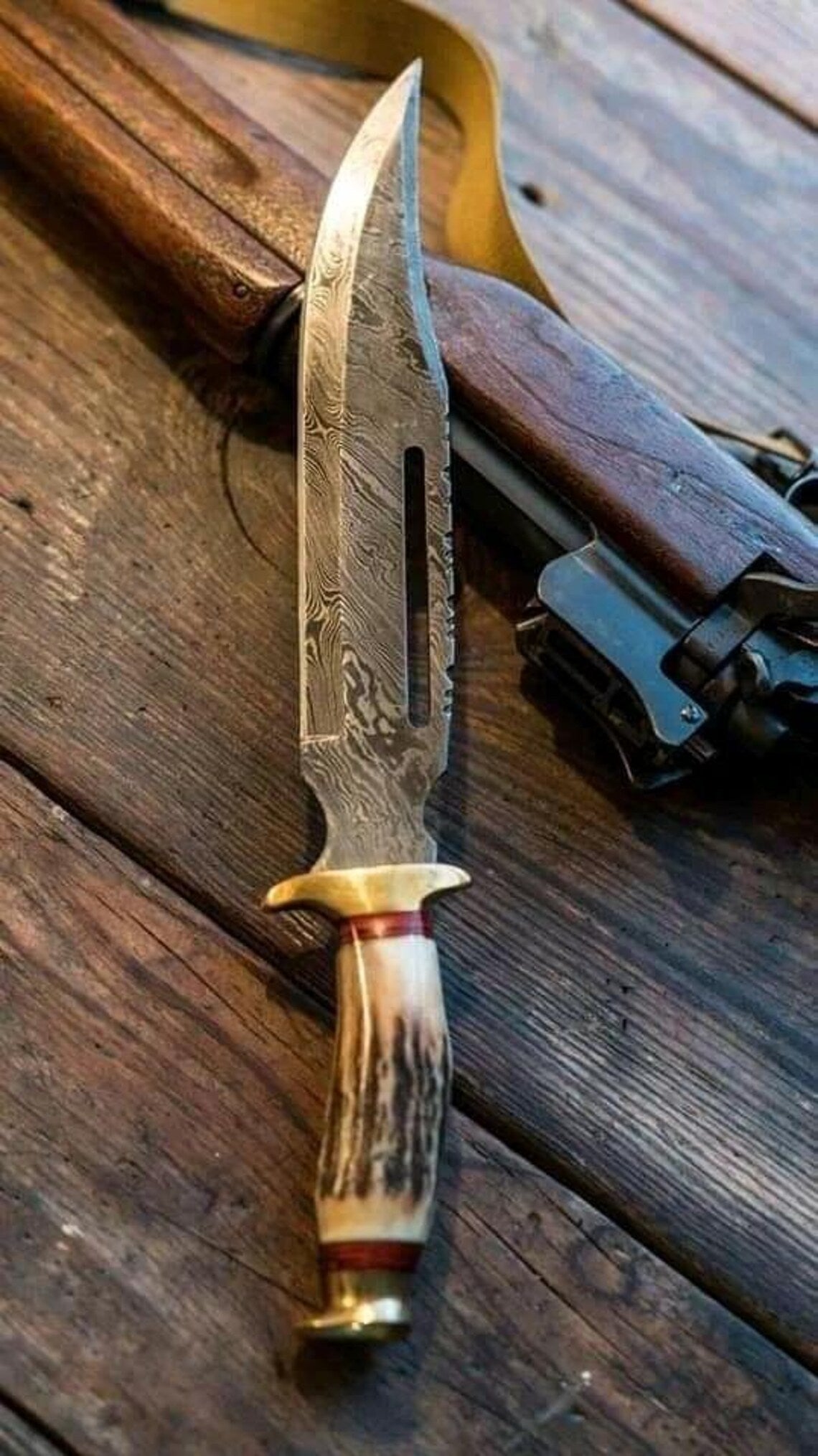 Brass Guard Bowie Knife with Stag Horn Handle and Damascus Steel Blade.
