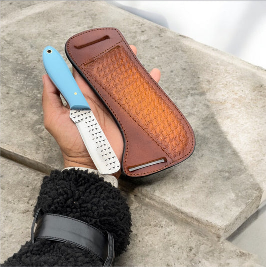 "Bull Cutter Cowboy Knife with durable rasp tool blade, resin handle, and leather belt loop case for outdoor use."

