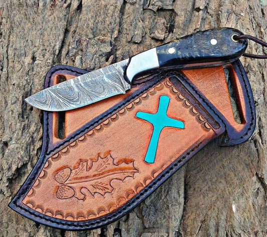 Cowboy Bull Cutter Knife with 4.5-inch Damascus steel blade and sheep horn handle.