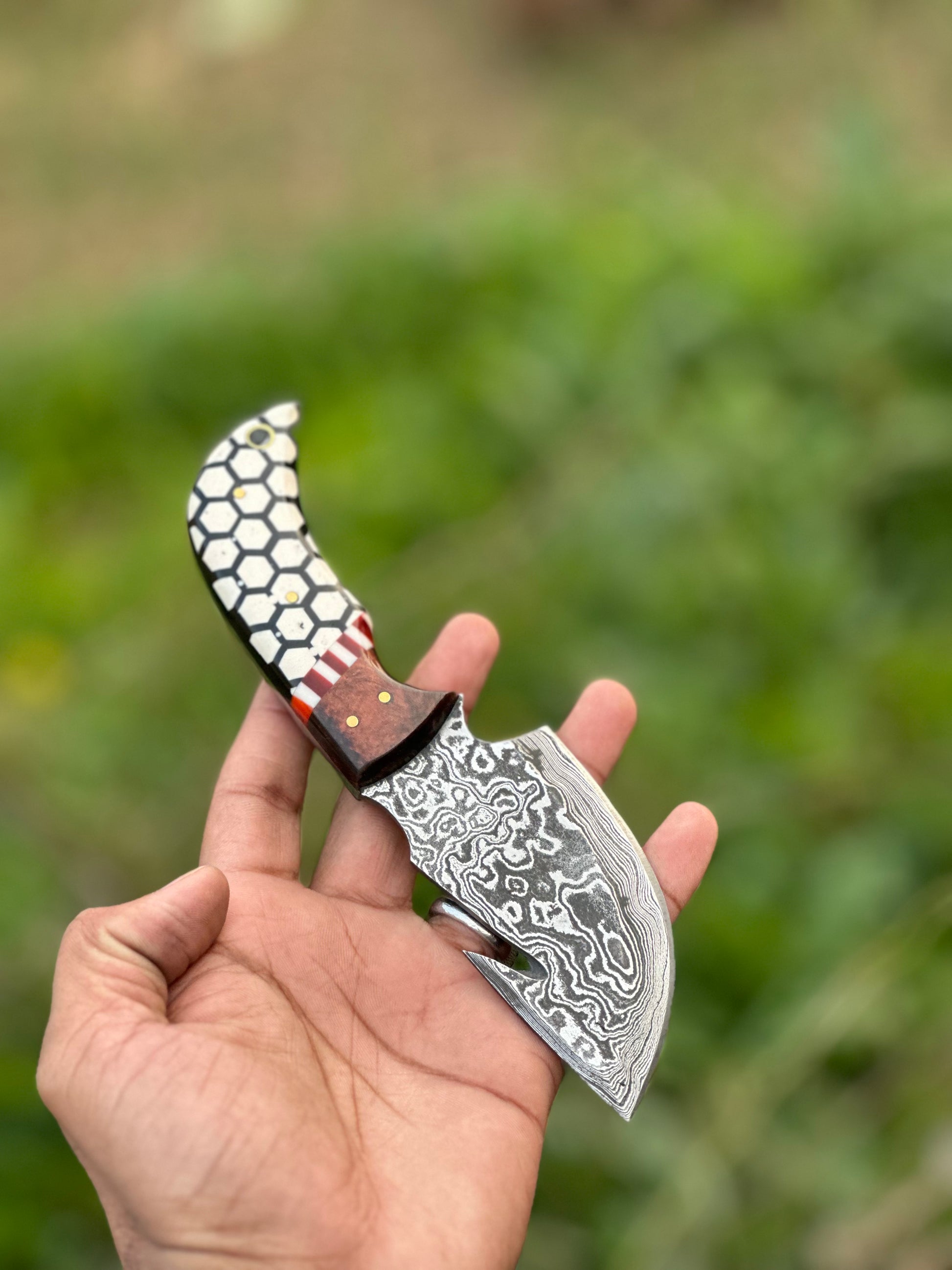 Custom Damascus guthook skinning knife with a rosewood and resin handle, perfect gift item with leather sheath