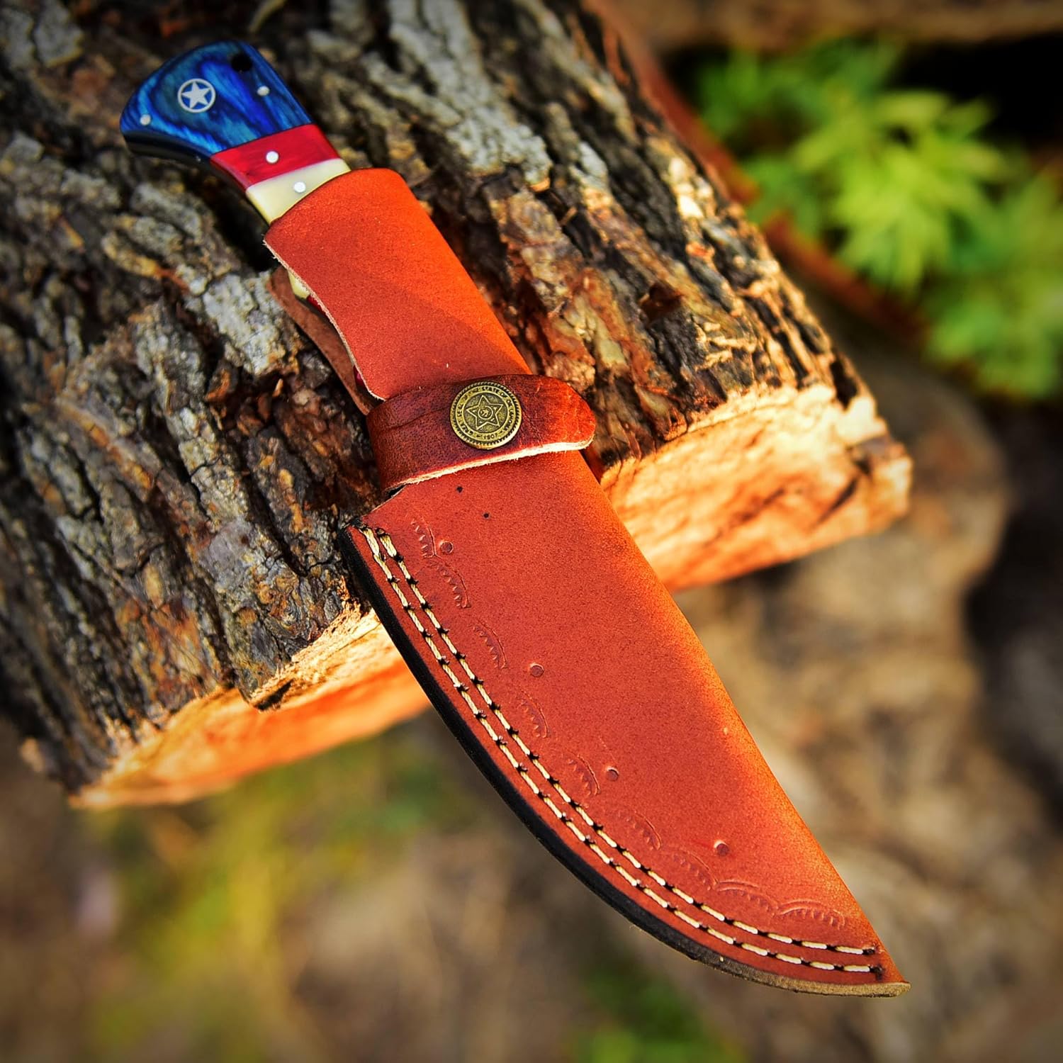 Custom Damascus steel skinning knife with 4.5-inch blade and American flag handle, ideal for precision skinning and outdoor enthusiasts
