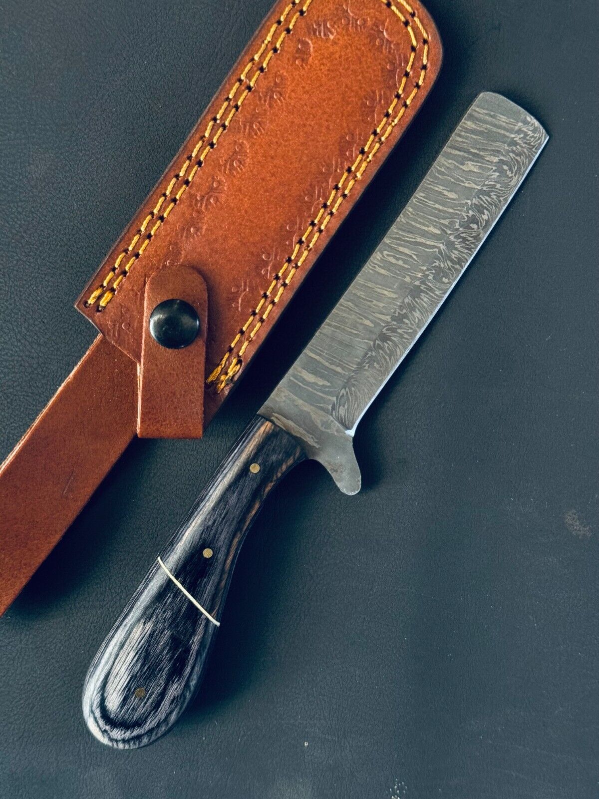 Custom calf cutter knife with Damascus steel blade and leather sheath