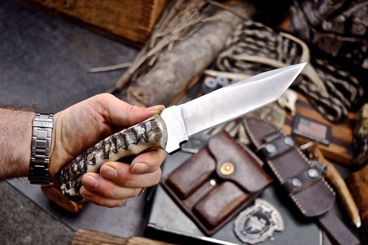 Custom handmade 4.5-inch J2 steel skinner knife with a sheep horn handle, ideal for skinning, hunting, and outdoor use.