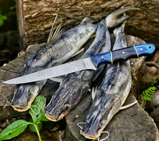 Custom handmade Damascus boning knife with pakkawood handle and leather sheath
