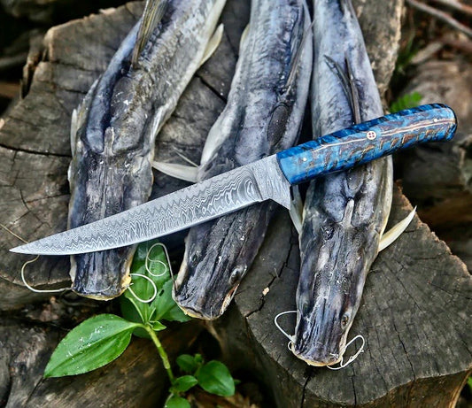 Custom handmade Damascus fillet knife with pine cone handle and leather sheath