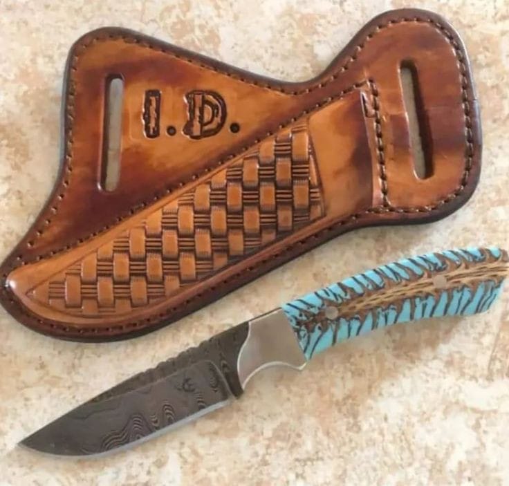 Custom handmade Damascus steel belt knife with a 3.5-inch blade, pain cone resin handle, and leather sheath, perfect for cowboy enthusiasts and collectors in Canada