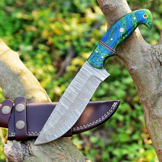 Custom handmade Damascus steel skinning knife with 4.5-inch blade and ergonomic resin handle for precision skinning
