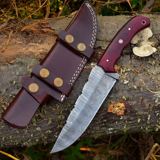 Custom handmade Damascus steel skinning knife with a 4.5-inch blade and durable G10 handle, ideal for precision hunting and outdoor use.