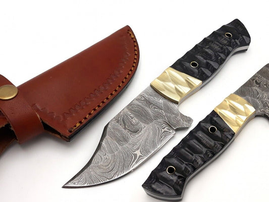 Custom handmade Damascus steel skinning knife with resin handle
