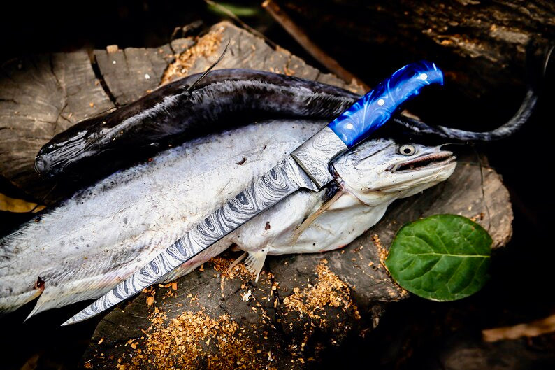Custom handmade angling knife with Damascus steel blade resin handle and leather sheath