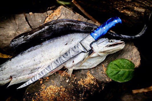 Custom handmade angling knife with Damascus steel blade resin handle and leather sheath