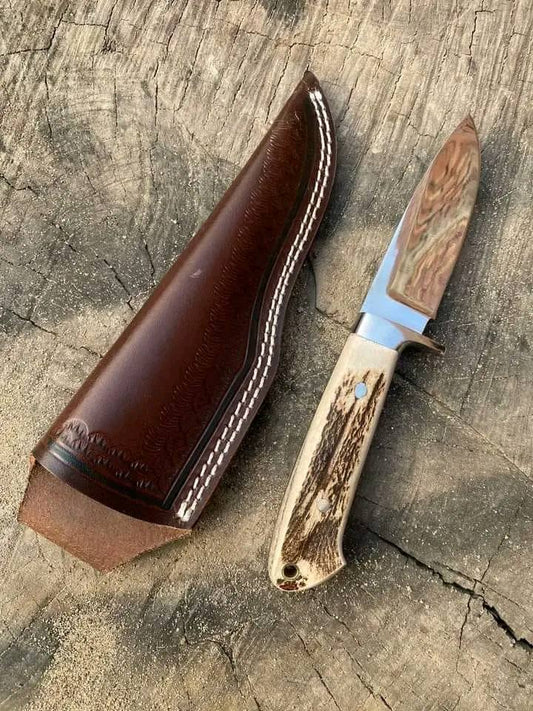 Custom handmade knife belt with J2 steel blade and stag horn handle
