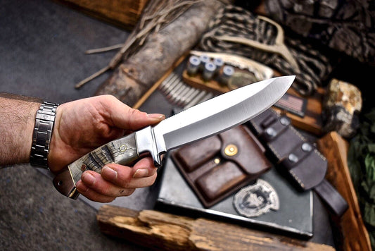 Custom handmade skinner knife with a 4.5-inch J2 steel blade, sheep horn handle, and steel bolster, ideal for skinning and outdoor use"
