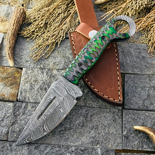 Custom handmade small hunting knife with a 4-inch Damascus steel blade and pakkawood handle, perfect for outdoor use and gifting.