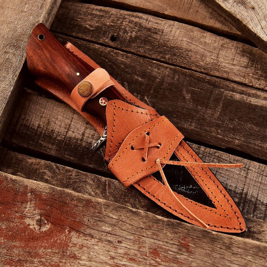 Custom handmade small hunting knife with a 5-inch Damascus steel blade, rosewood handle, and Damascus steel guard, displayed with a leather sheath.