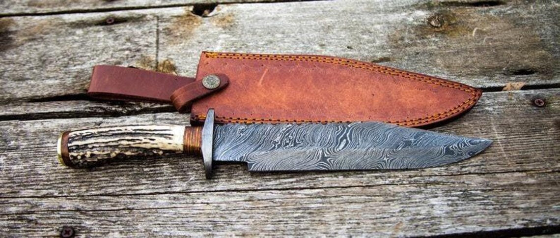 Damascus Steel 1800s Bowie Knife with Stag Horn Handle and Leather Sheath.