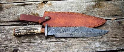 Damascus Steel 1800s Bowie Knife with Stag Horn Handle and Leather Sheath.