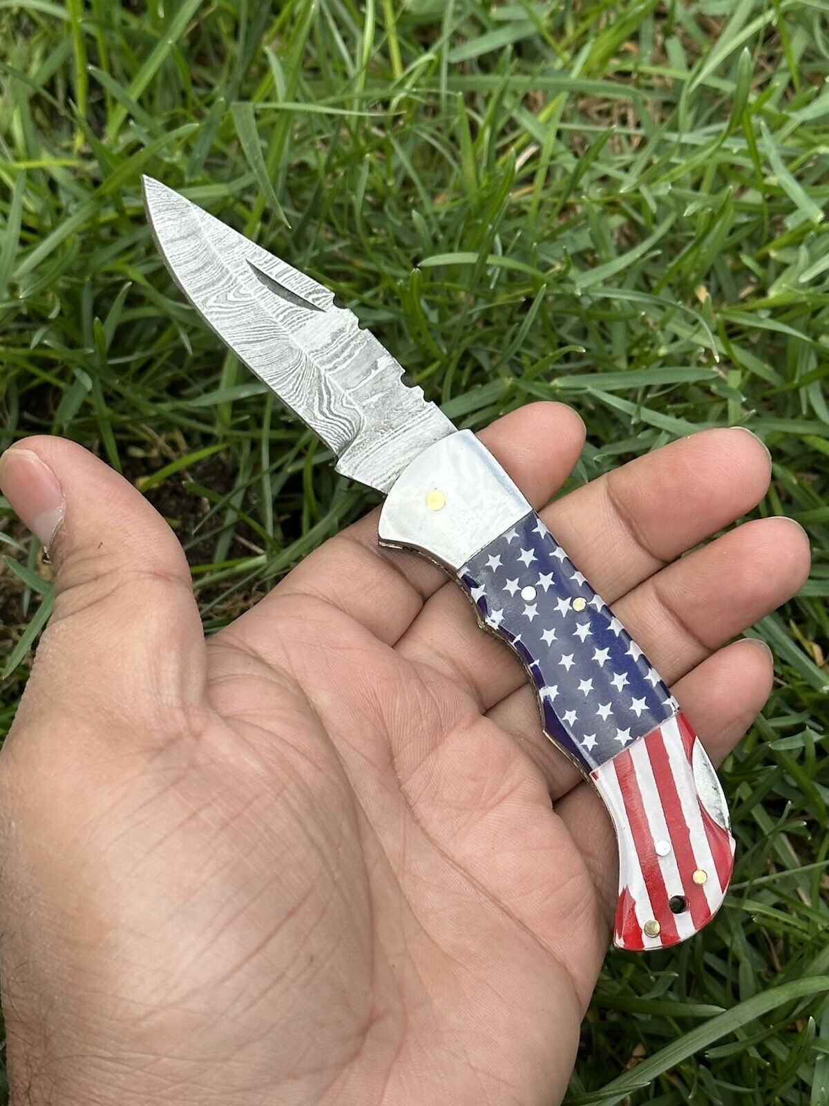 "Damascus Steel Blade Pocket Knife with Blue and Red Pakka Wood Handle"