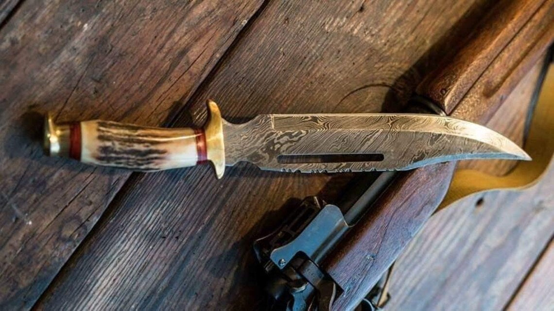 Damascus Steel Vintage Bowie Knife with Leather Sheath and Brass Guard.