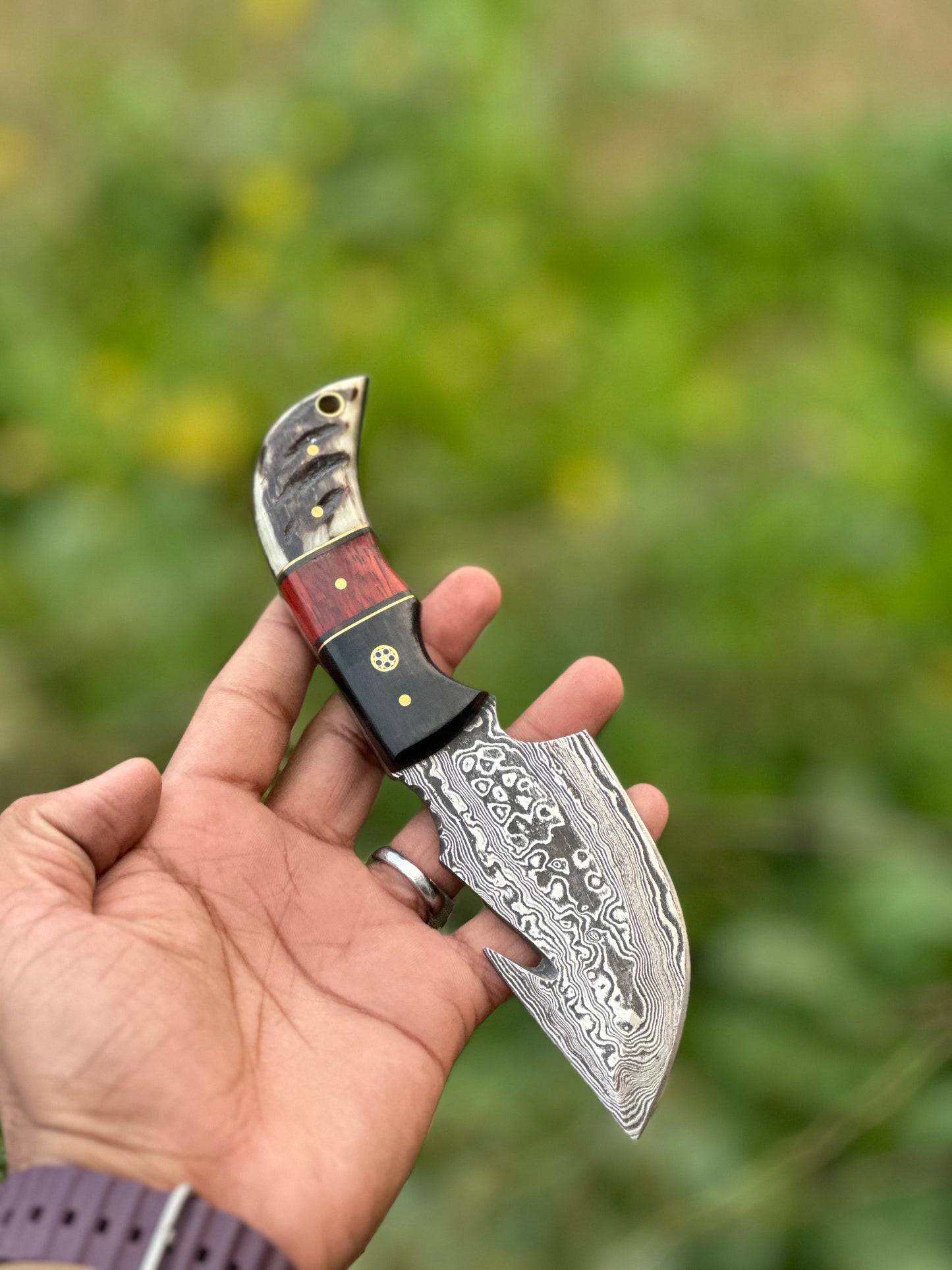 Premium Damascus guthook knife with a resin handle, perfect gift item with custom leather sheath