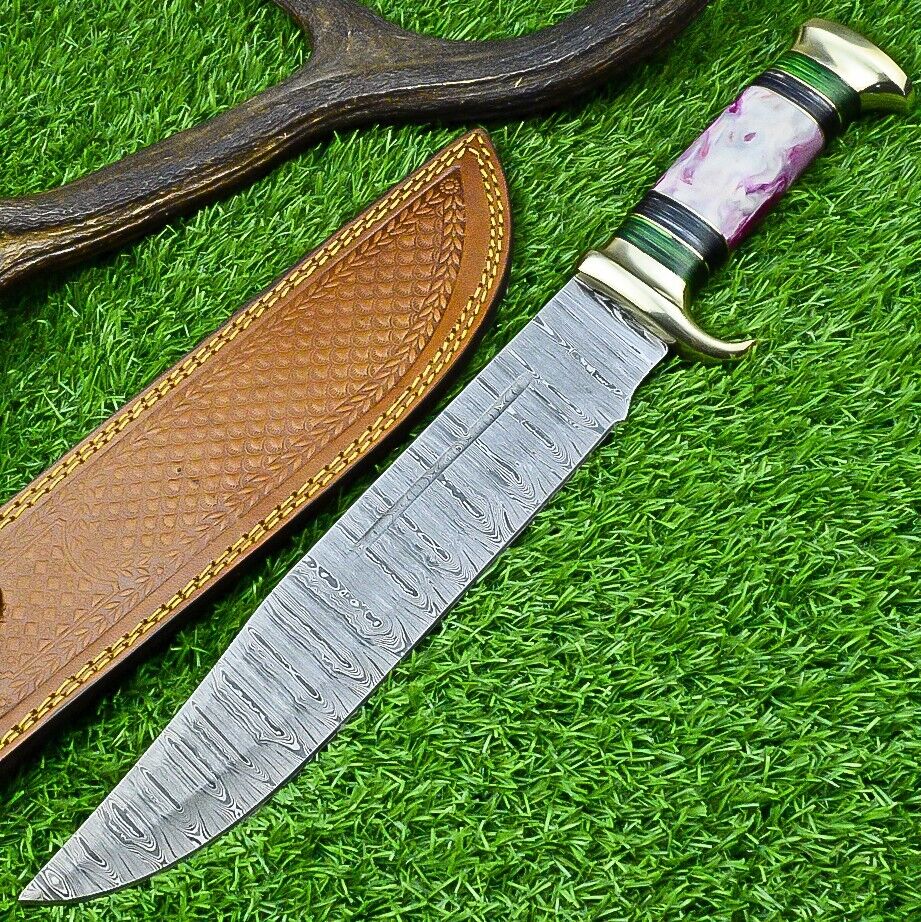 "Damascus steel bowie knife with pakkawood resin handle and brass guard"
