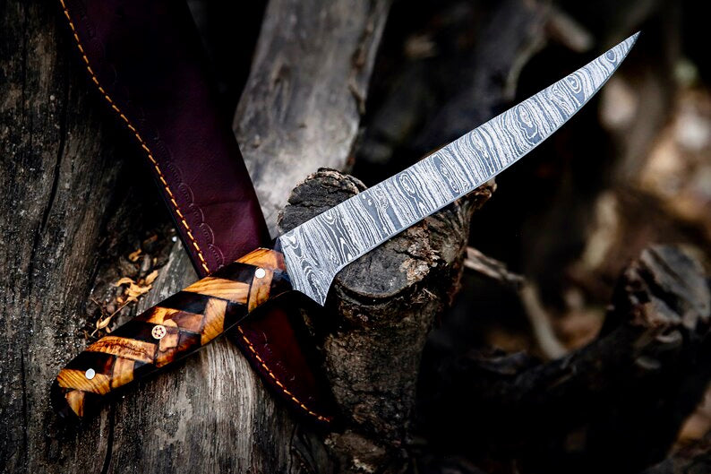 Damascus steel fillet knife with olive wood handle and leather sheath