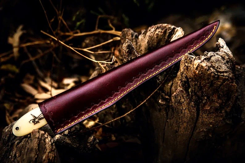 Damascus steel filleting knife for fish with custom leather sheath