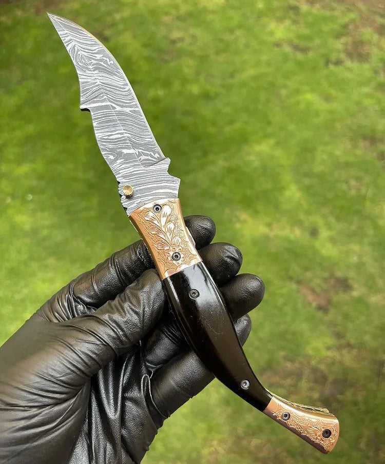 EDC folding pocket knife with Damascus blade and colorful bone handle, leather sheath included.