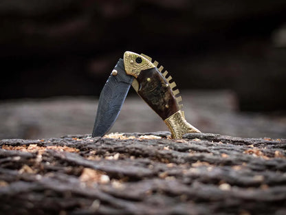 Exquisite fish style Damascus folding knife with sheep horn handle and brass accents, perfect gift item with leather sheath.