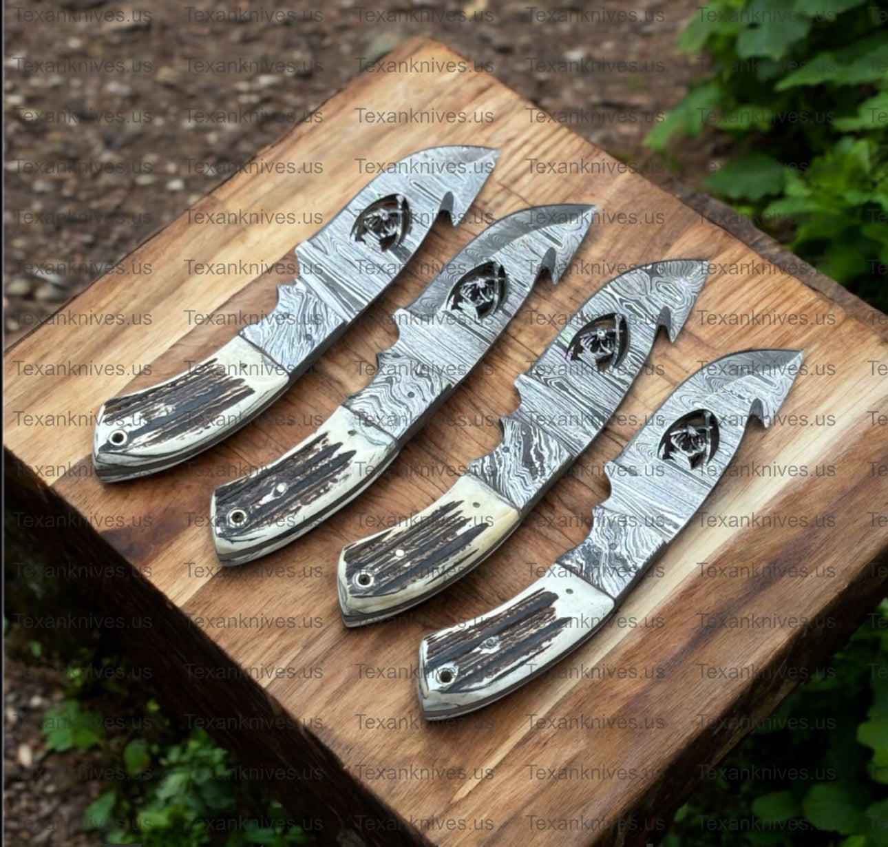 Guthook Hunter knife with stag horn handle and Damascus steel bolster
