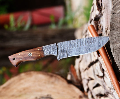 Handcrafted Damascus skinning knife with 5-inch blade and rosewood handle, designed for outdoor use and precision cuts