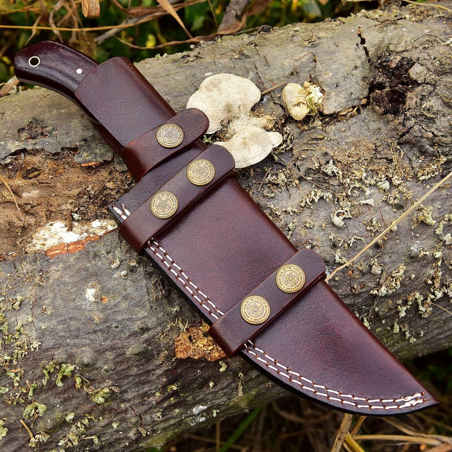 Handcrafted Damascus steel skinning knife with 4.5-inch blade and G10 handle, perfect for hunting and field dressing