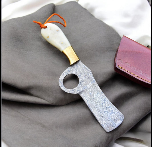 "Handcrafted Western Belt Knife with a sharp Damascus steel blade, camel bone handle, and brass bolster."

