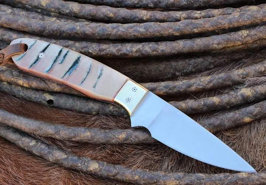 "Handcrafted Western belt knife with D2 steel blade and sheep horn handle on leather sheath"

