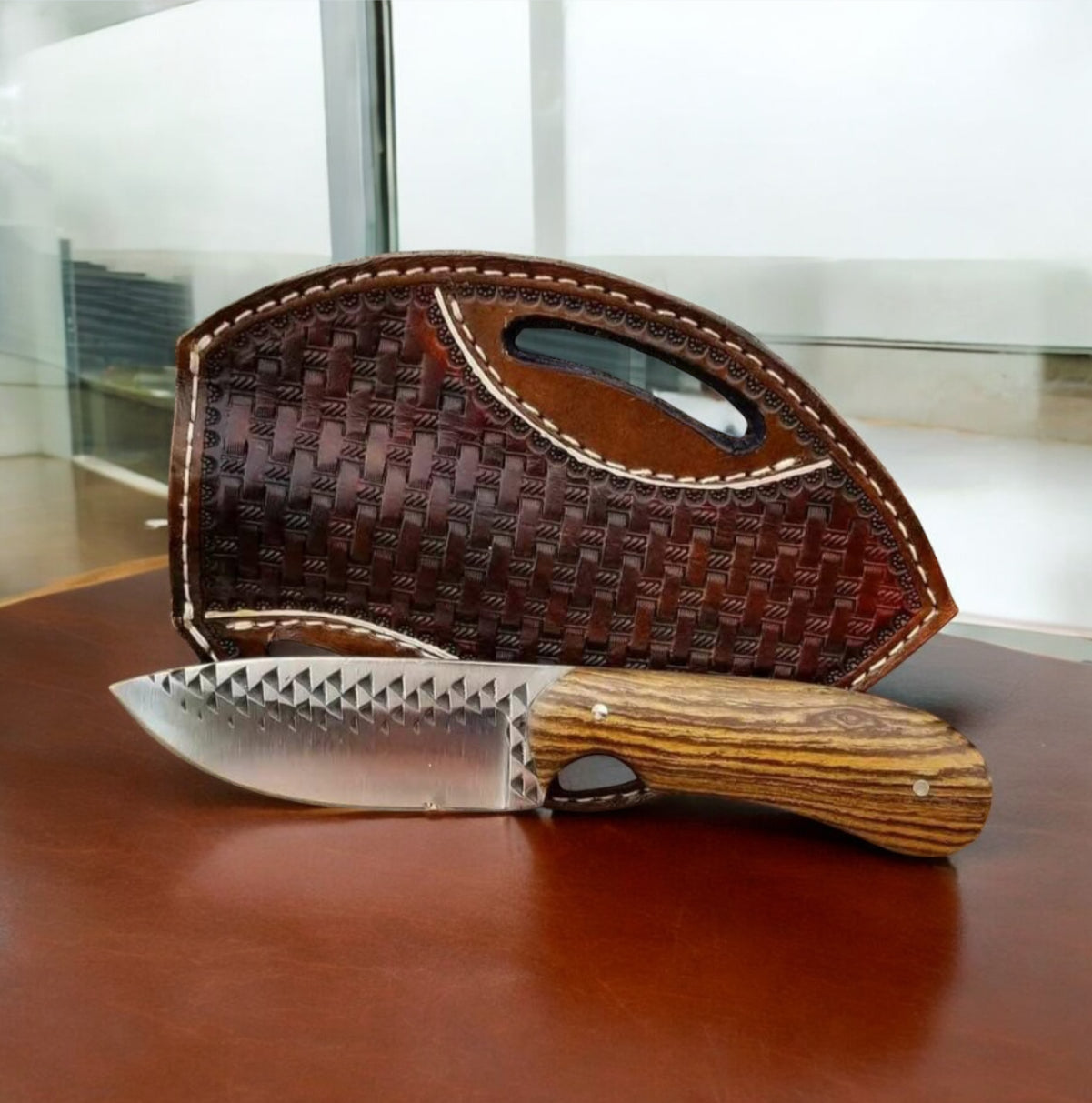 "Handcrafted Western belt knife with olive wood handle and leather sheath"

