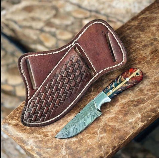 Handcrafted Western fixed blade knife with Damascus steel blade, pain cone handle, and leather sheath – ideal for outdoor adventures