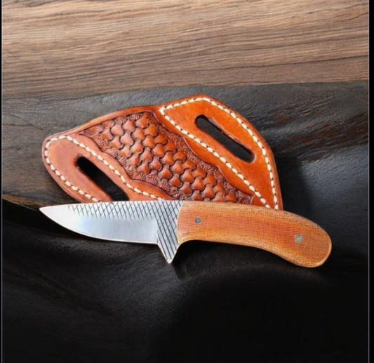 "Handcrafted belt knife with rasp tool blade, resin handle, and leather case – 8-inch overall length – perfect for outdoor adventures."


