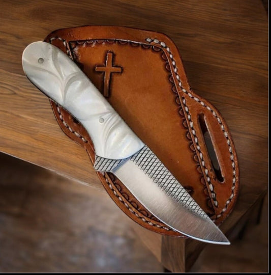 "Handcrafted western belt knife with rasp tool steel blade and resin handle, displayed in a leather sheath."

