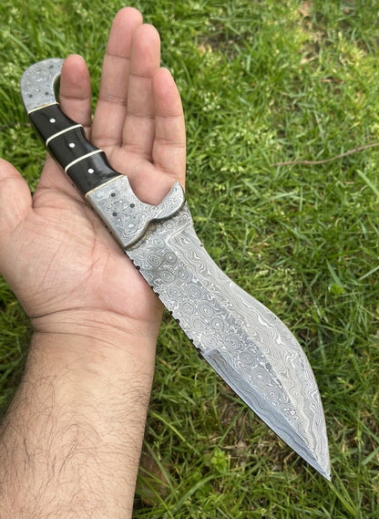 Handmade 12" Damascus blade hunting knife with buffalo horn handle, includes leather sheath.