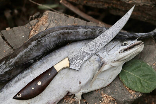 Handmade Damascus fillet knife with 8-inch blade rosewood handle brass bolster and leather sheath